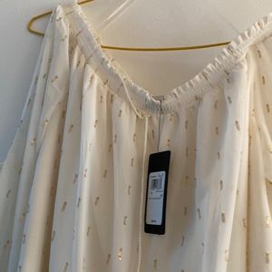Beautiful guess white and gold lined with cutout sleeve blouse